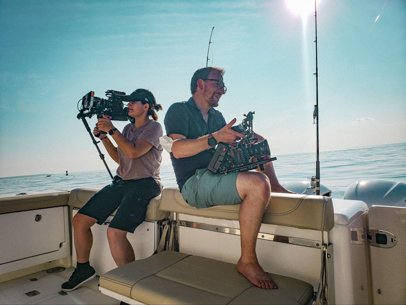 Filmmakers shooting 2-camera vérité for HBO Max’s “Gaming Wall St” on a boat in Connecticut