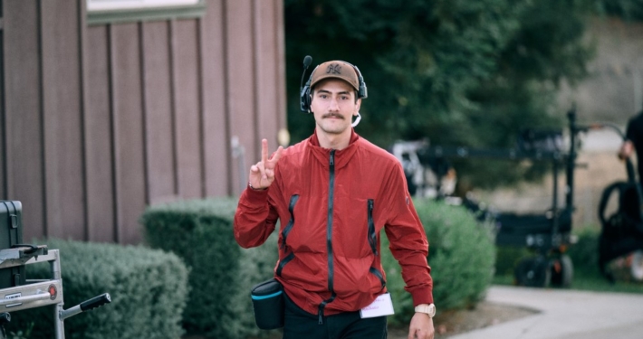 Filmmaker making peace sign - "2 Things Every Filmmaker Needs to Survive & Thrive"