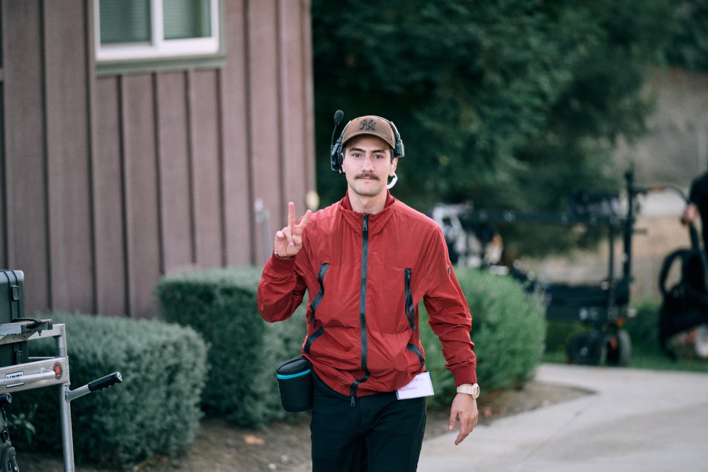 Filmmaker making peace sign - "2 Things Every Filmmaker Needs to Survive & Thrive"