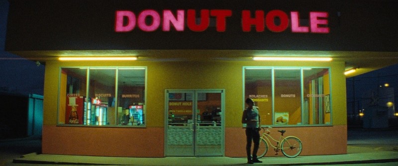 Mikey standing outside the Donut Hole - Red Rocket (2021) | Cre Film