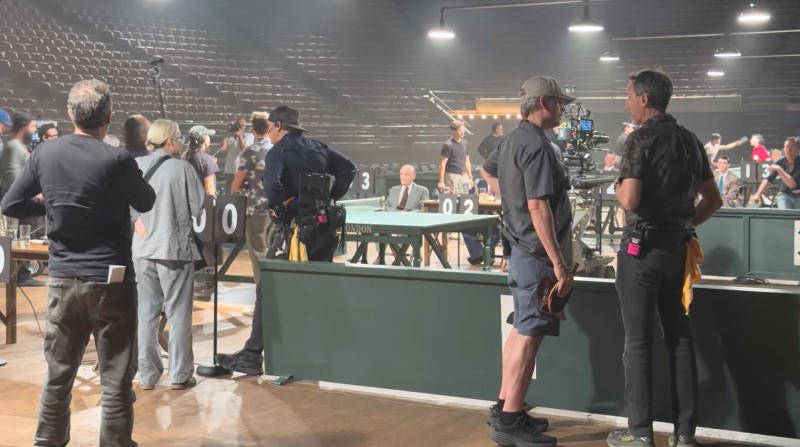 On set of Marty Supreme table tennis tournament