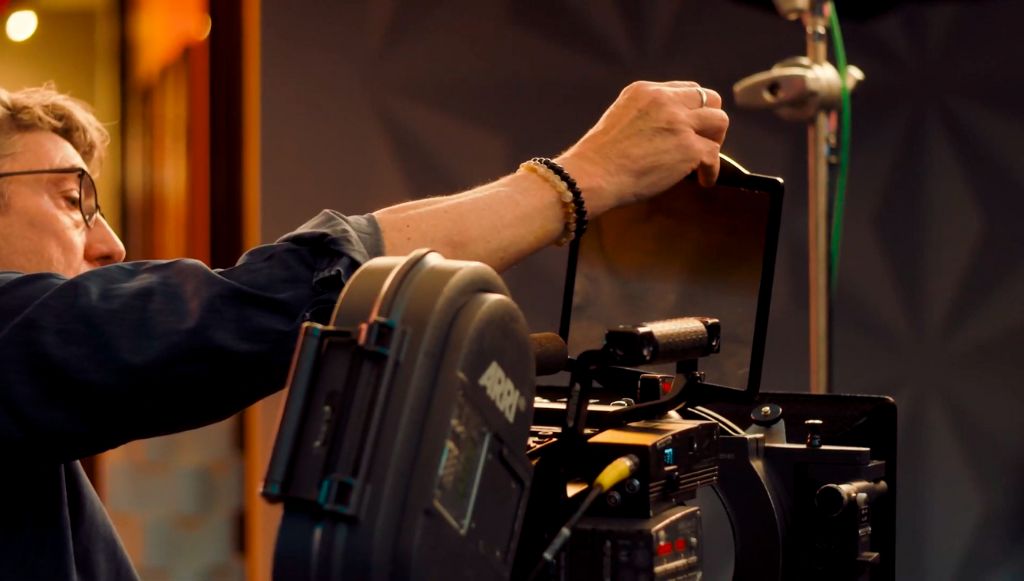 Shane Hurlbut places filter into camera matte box